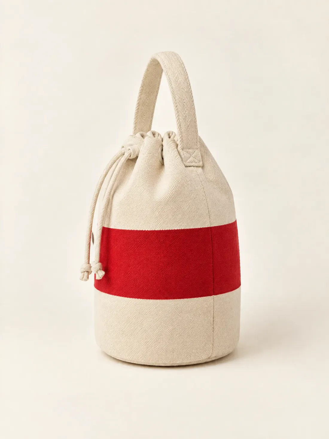 Buoy Round Bucket Bag in Cream / Signal Red, side and back view
