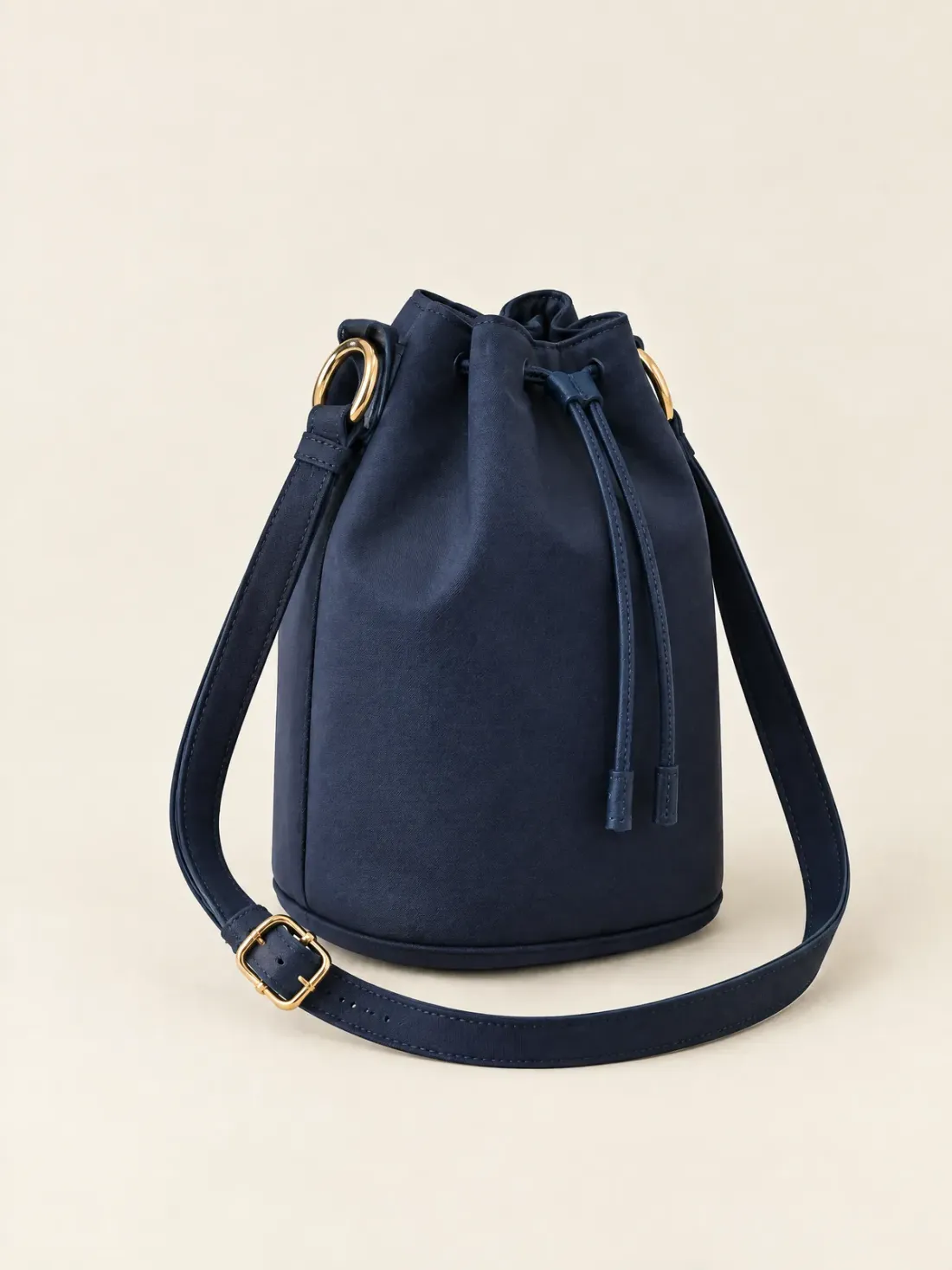 Crossbody Mini Bucket in Ink / Gold-Tone, side and back view