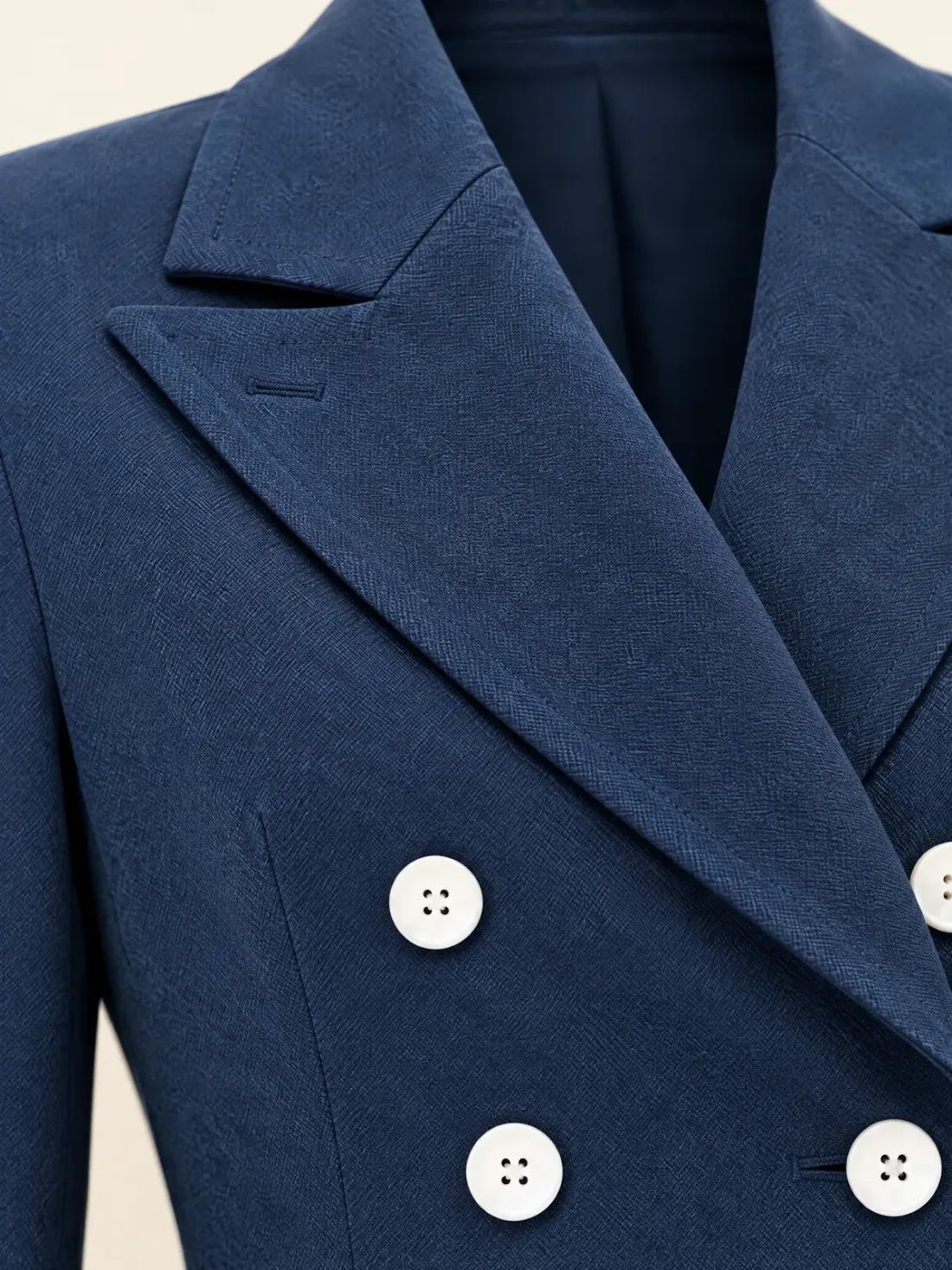 Harbour Double-Breasted Crop Jacket, close-up of the notch lapel and the white buttons