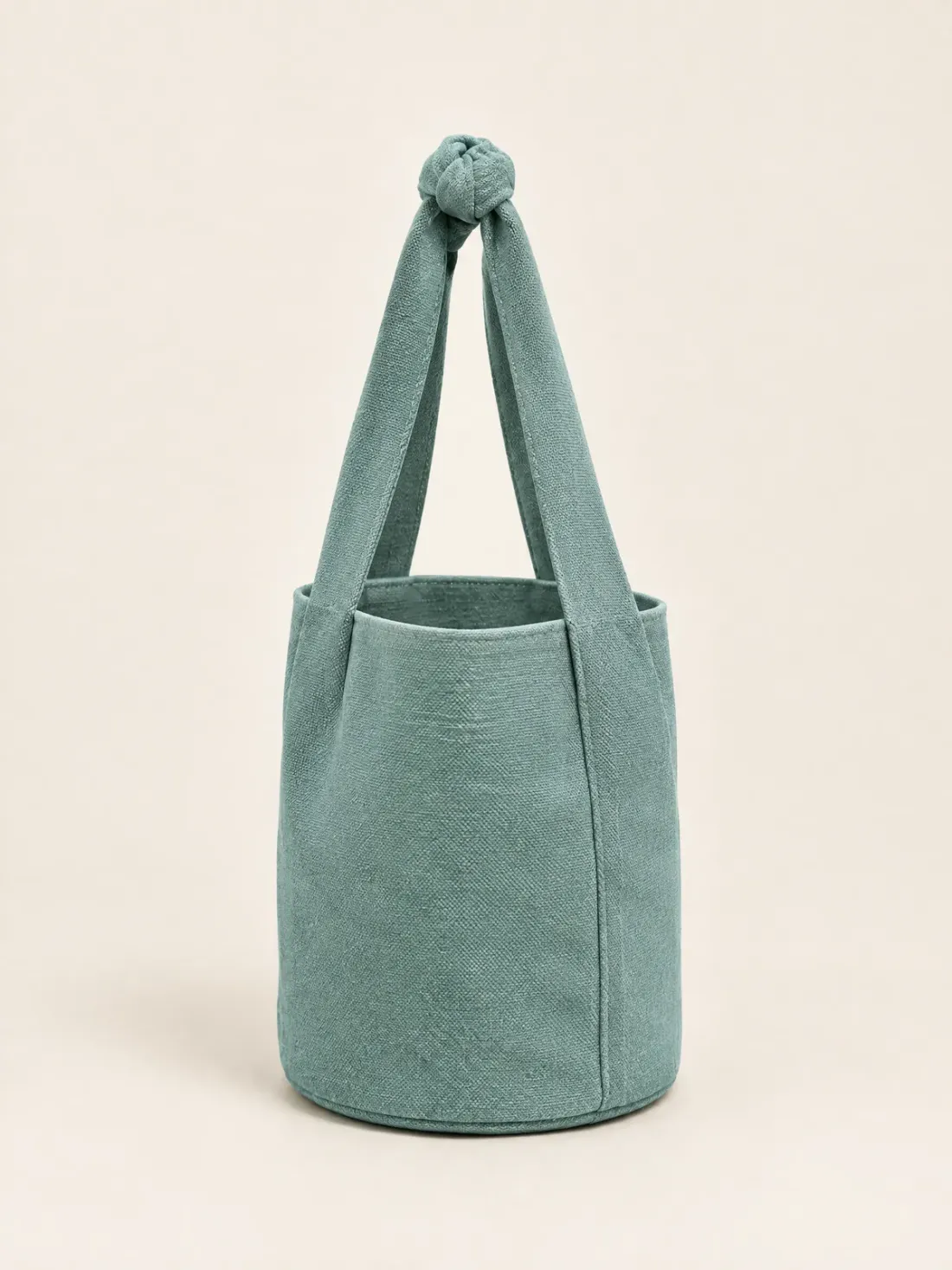 Knot Top Canvas Bucket in Sea Glass, side and back view