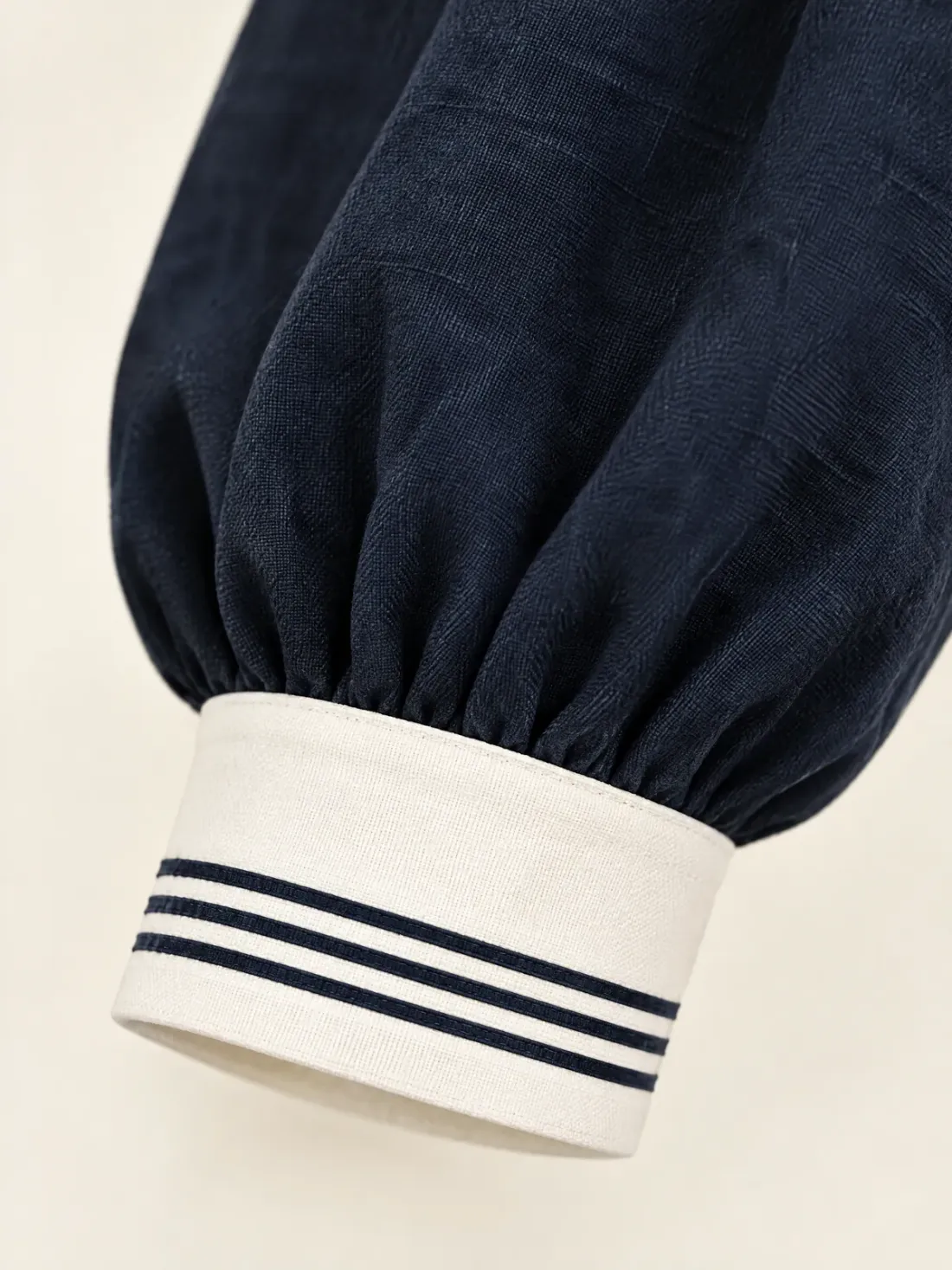 Lantern Long-Sleeve Middy Crop, close-up of the chalk cuff with three thin ink stripes at the end of the gathered lantern sleeve