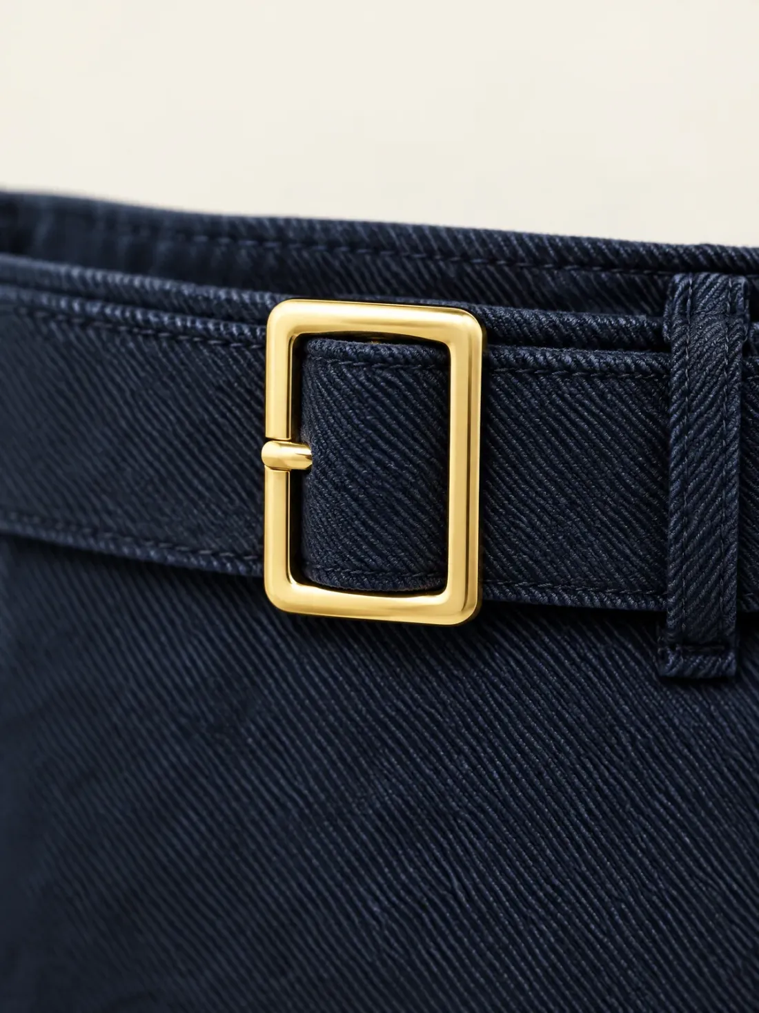 Mooring Belted Mini, close-up of the gold-tone rectangular buckle on the self belt