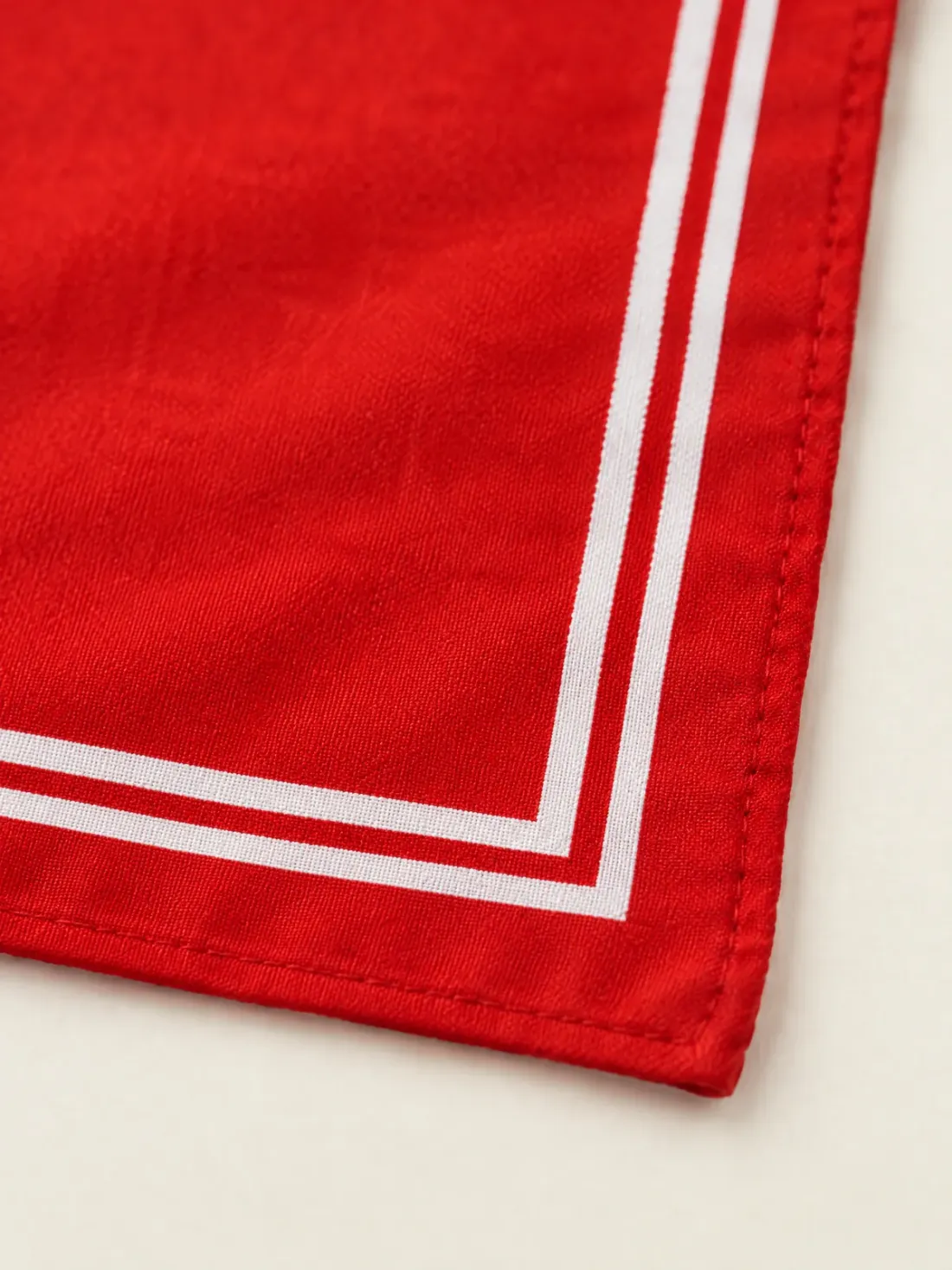 Signal Border Neckerchief, close-up of the double white border lines on the red corner